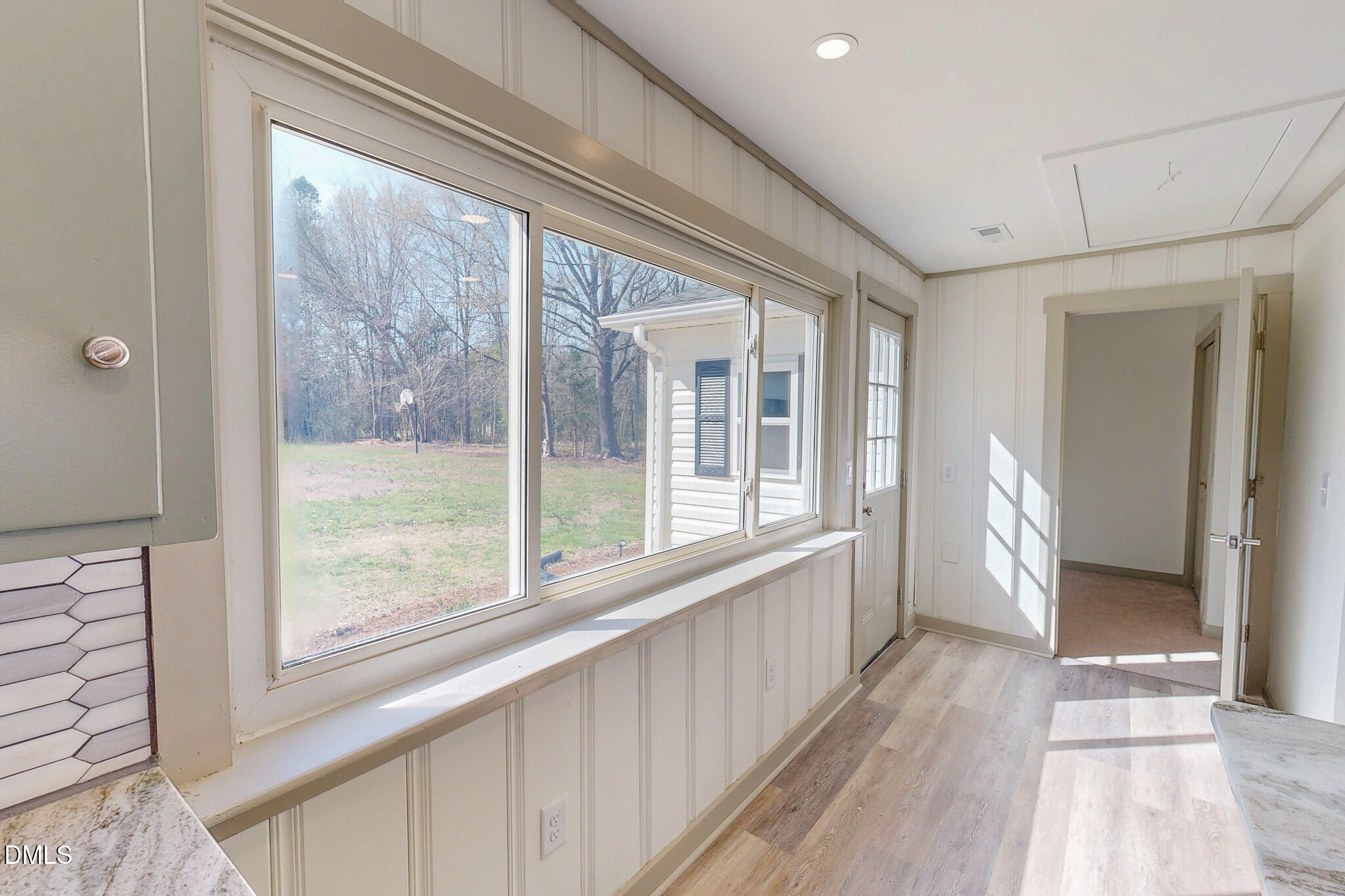 474 Providence Road Roxboro, NC 27573 - Photo 26 of 30 a view of a porch with wooden floor and windows