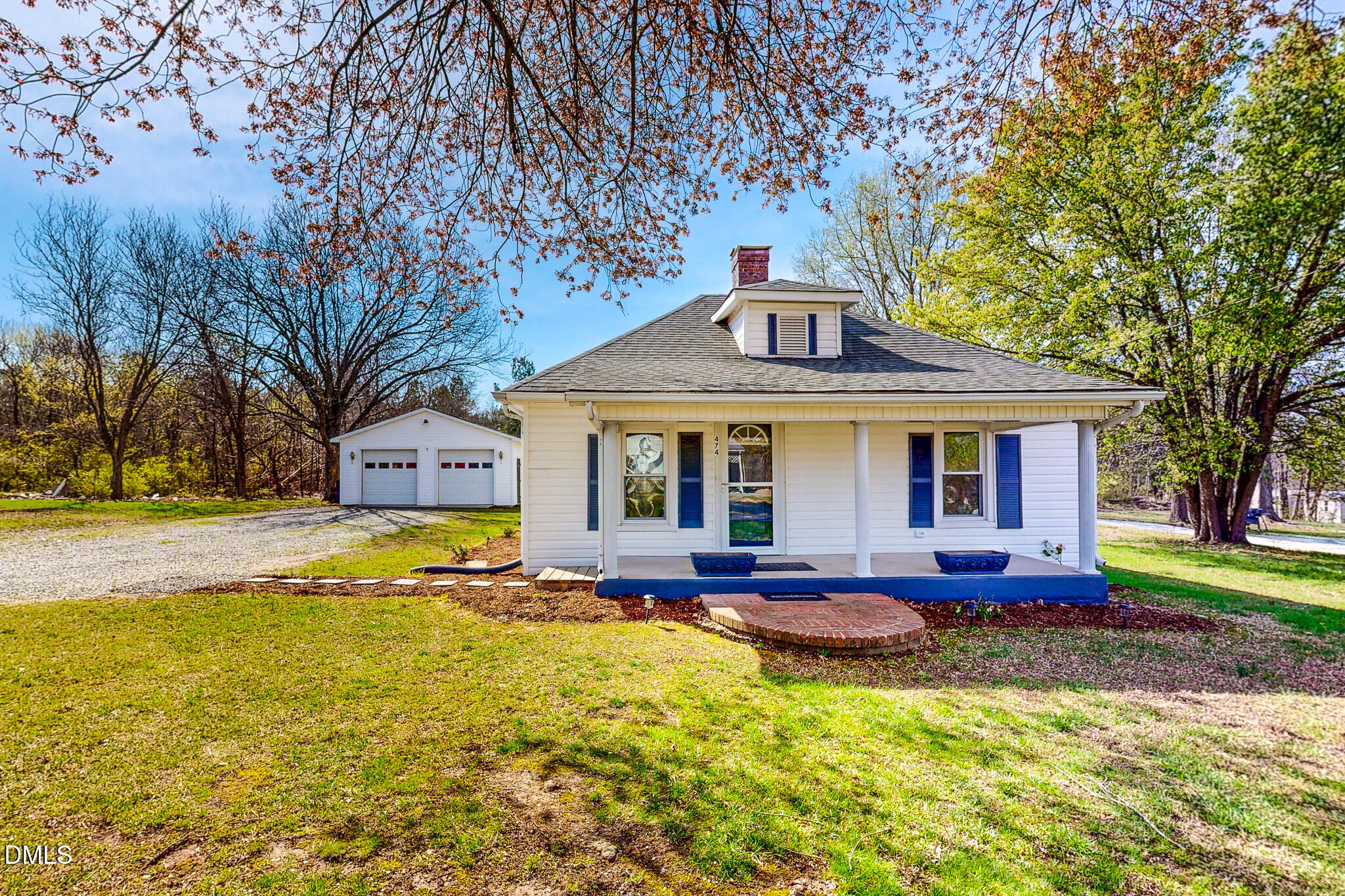 474 Providence Road Roxboro, NC 27573 - Photo 29 of 30 a front view of house with swimming pool and outdoor seating