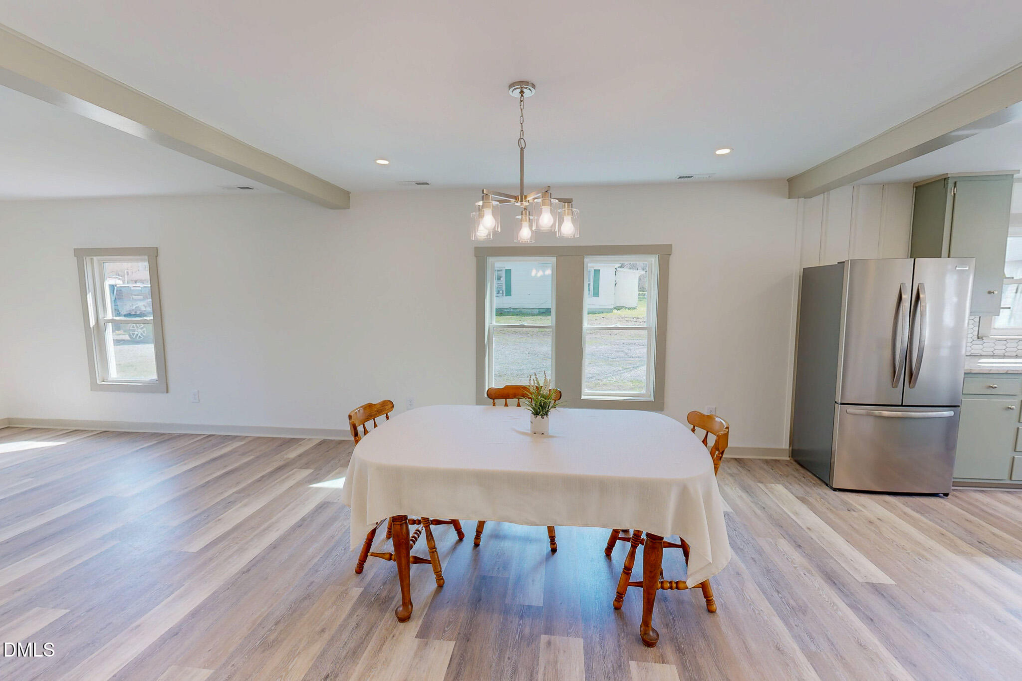 474 Providence Road Roxboro, NC 27573 - Photo 5 of 30 a view of a dining room with furniture window and wooden floor