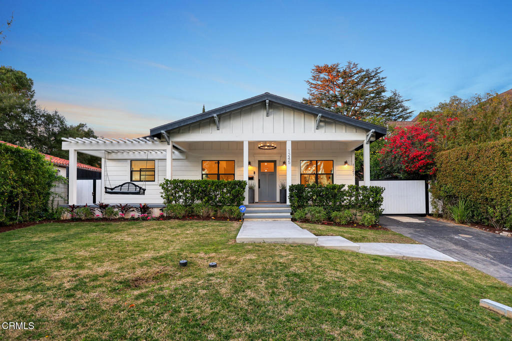 1245 East Howard Street Pasadena, CA 91104 - Photo 1 of 69 a front view of a house with a yard
