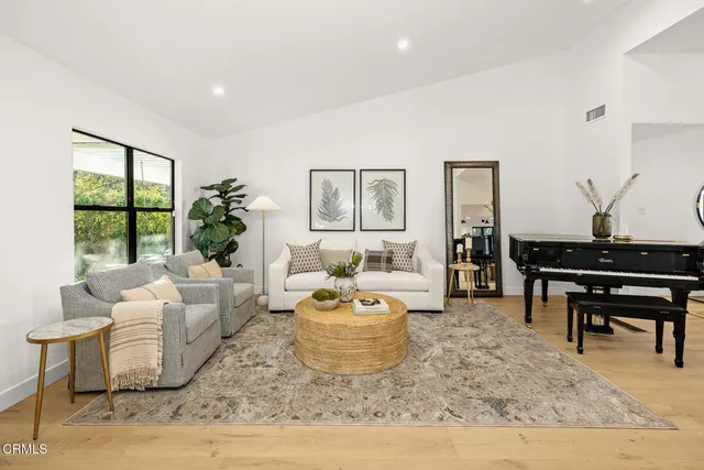 a dining room with furniture window wooden floor