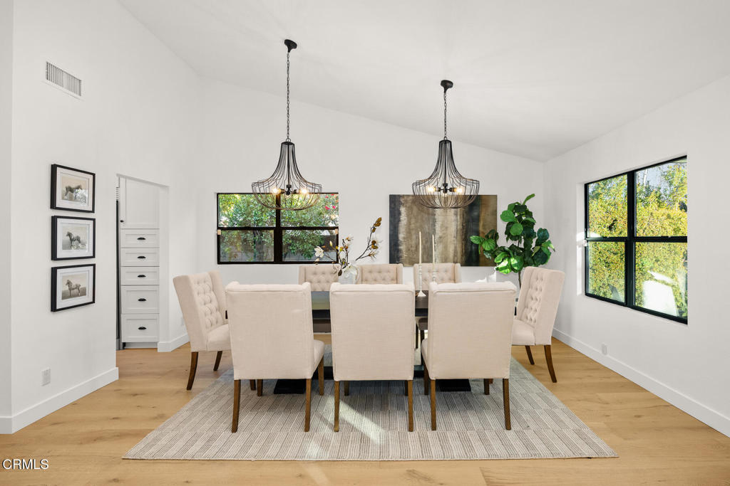 1245 East Howard Street Pasadena, CA 91104 - Photo 13 of 69 a dining room with furniture window wooden floor