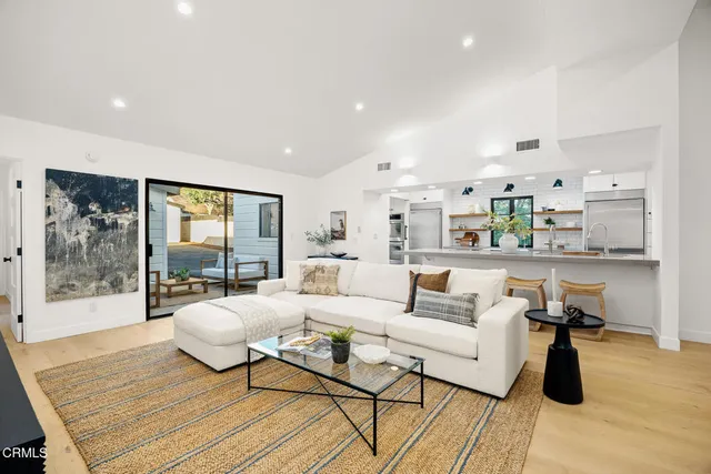 a kitchen with a table and chairs in it