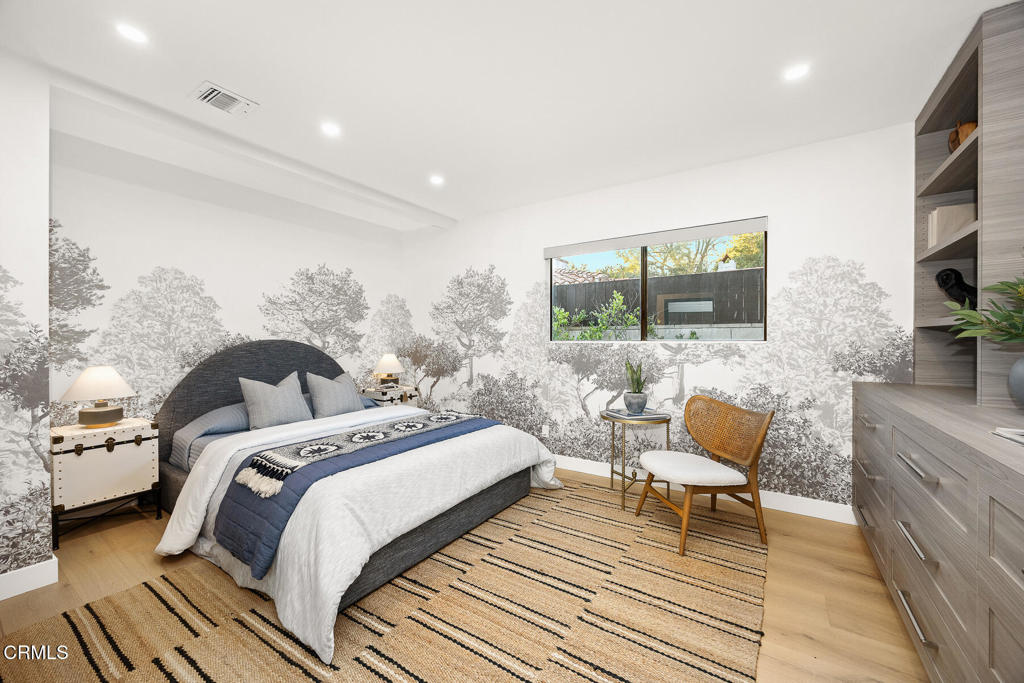 1245 East Howard Street Pasadena, CA 91104 - Photo 33 of 69 a bedroom with a bed and a couch