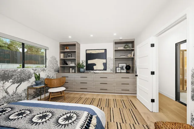 a bathroom with a toilet sink and shower