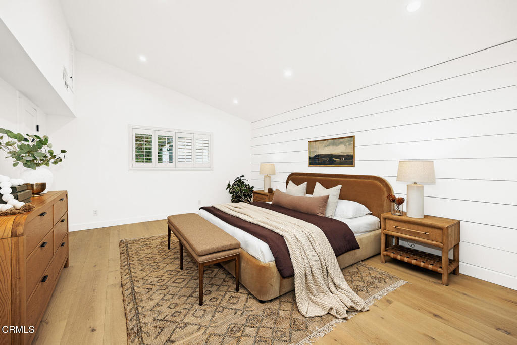 1245 East Howard Street Pasadena, CA 91104 - Photo 35 of 69 a bed room with bed and a chair