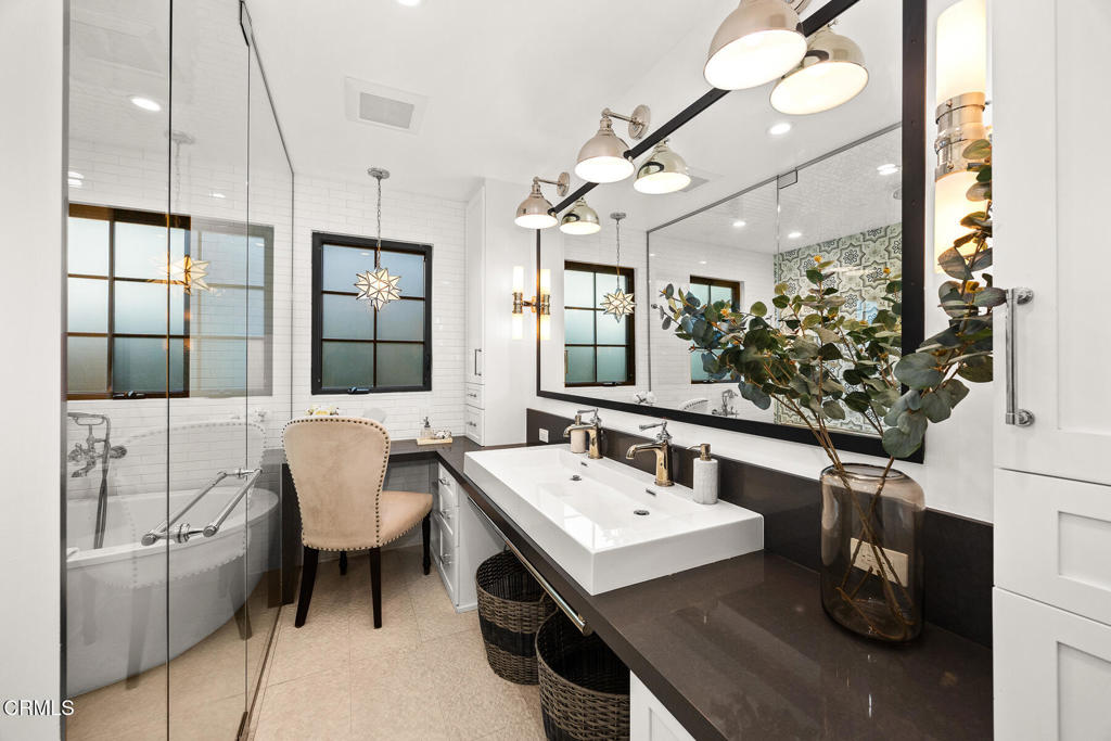 1245 East Howard Street Pasadena, CA 91104 - Photo 39 of 69 a bathroom with a sink and a mirror