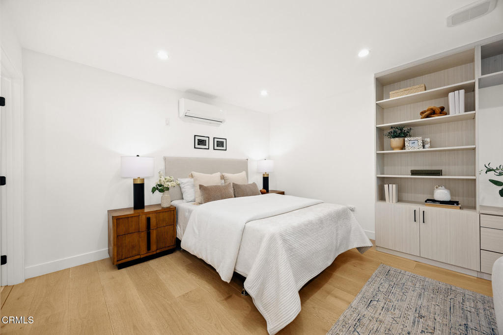 1245 East Howard Street Pasadena, CA 91104 - Photo 55 of 69 a bedroom with a bed and closet