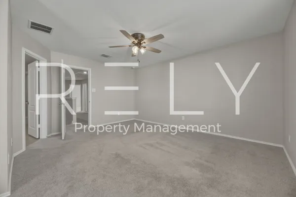 a bathroom with a toilet a sink and a mirror