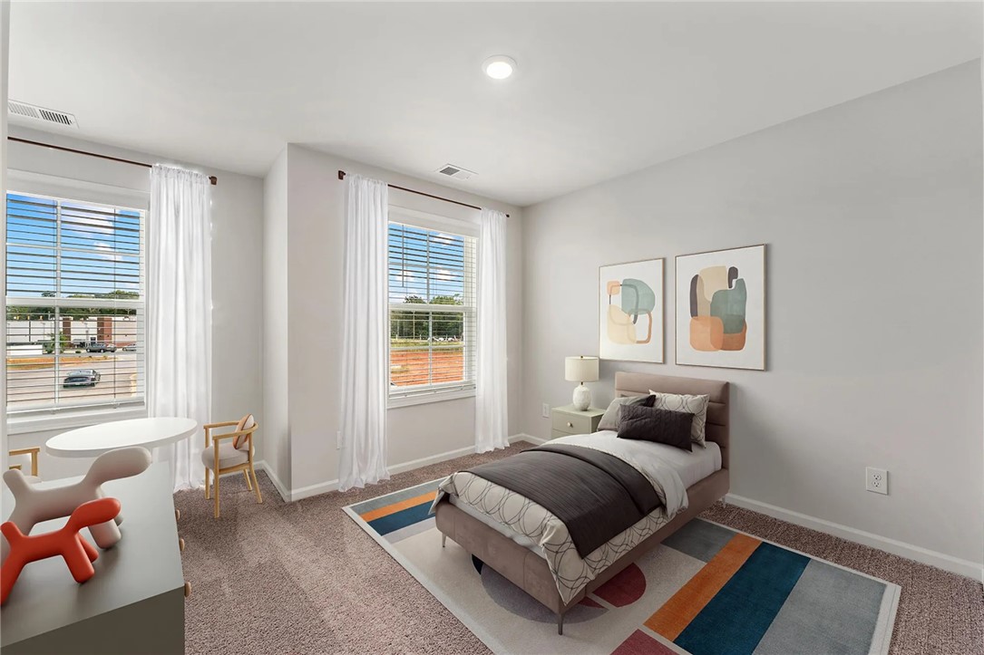 112 Cotesworth Street Pendleton, SC 29670 - Photo 8 of 9 Bright and airy, this bedroom offers comfort and a tranquil atmosphere.