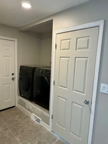 a view of a storage & utility room in a house