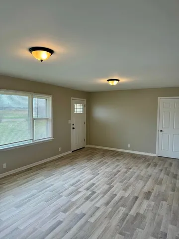 an empty room with window