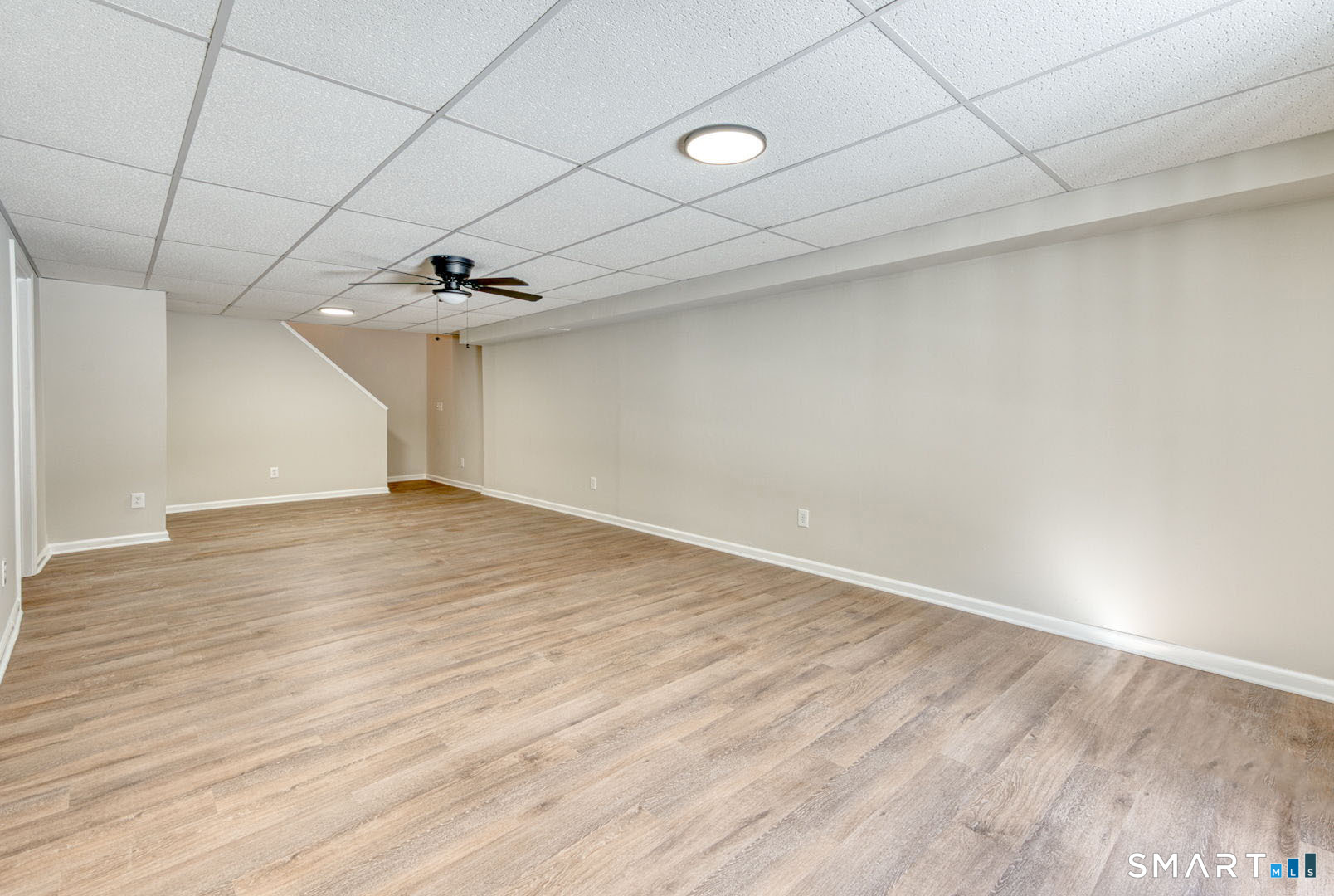 159 Jennifer Lane, Unit 159 Newtown, CT 06482 - Photo 26 of 28 wooden floor in an empty room