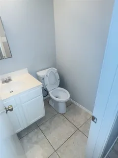 a bathroom with a sink and a toilet