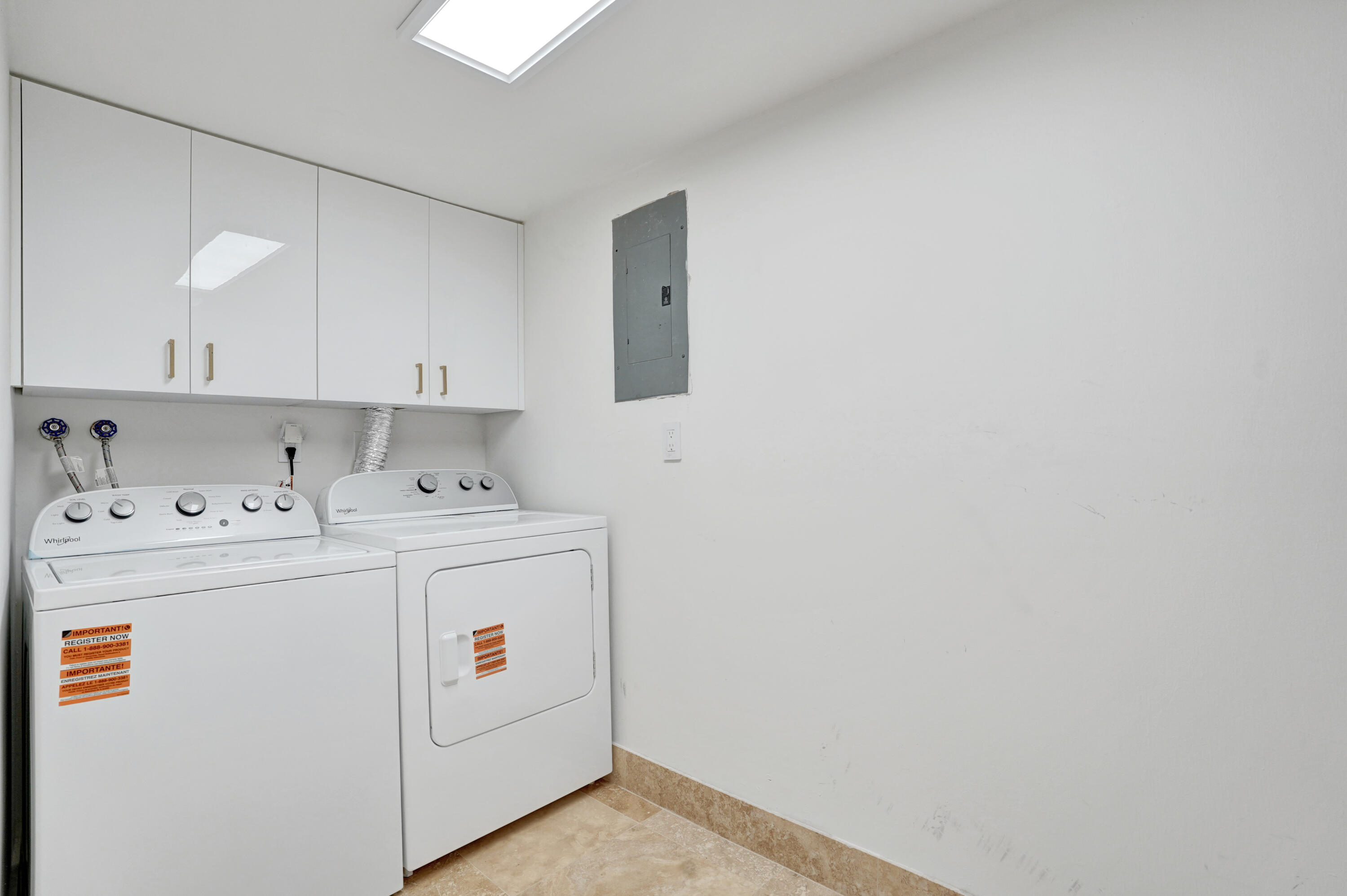 755 Dotterel Road, Unit 1112 Delray Beach, FL 33444 - Photo 28 of 64 a utility room with dryer and washer
