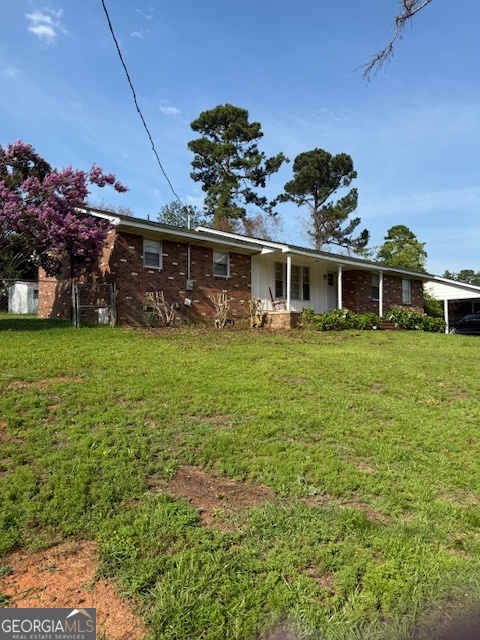 a view of a house with a big yard
