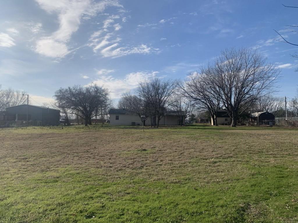 1210 Troy Road Wylie, TX 75098 - Photo 2 of 12 a view of a field with trees