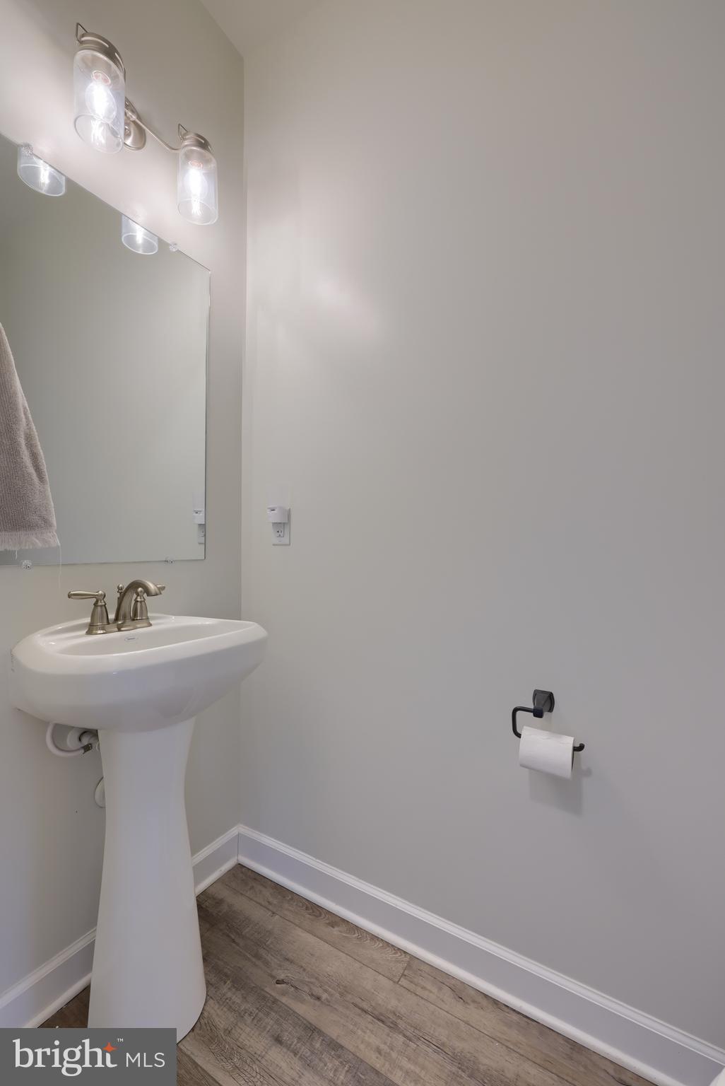 768 Weldon Drive York, PA 17404 - Photo 16 of 36 a bathroom with a sink and mirror