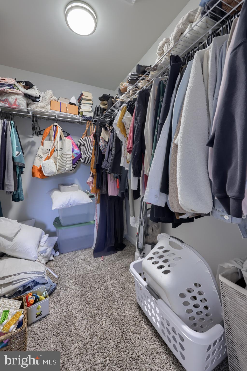 768 Weldon Drive York, PA 17404 - Photo 18 of 36 a view of walk in closet with clothes and shoes