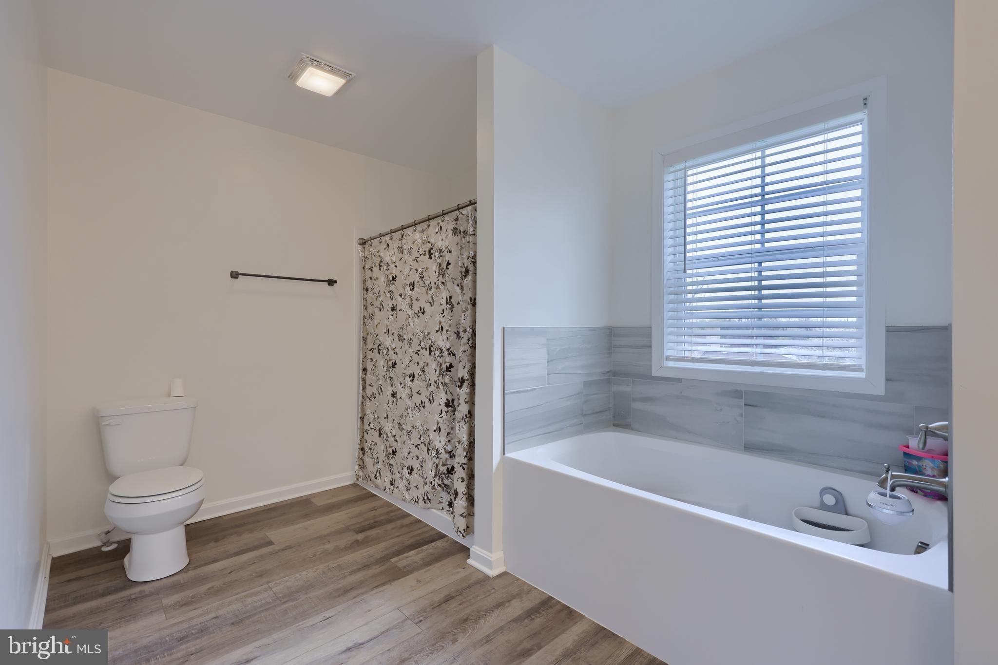 768 Weldon Drive York, PA 17404 - Photo 20 of 36 a white bath tub sitting next to a white toilet