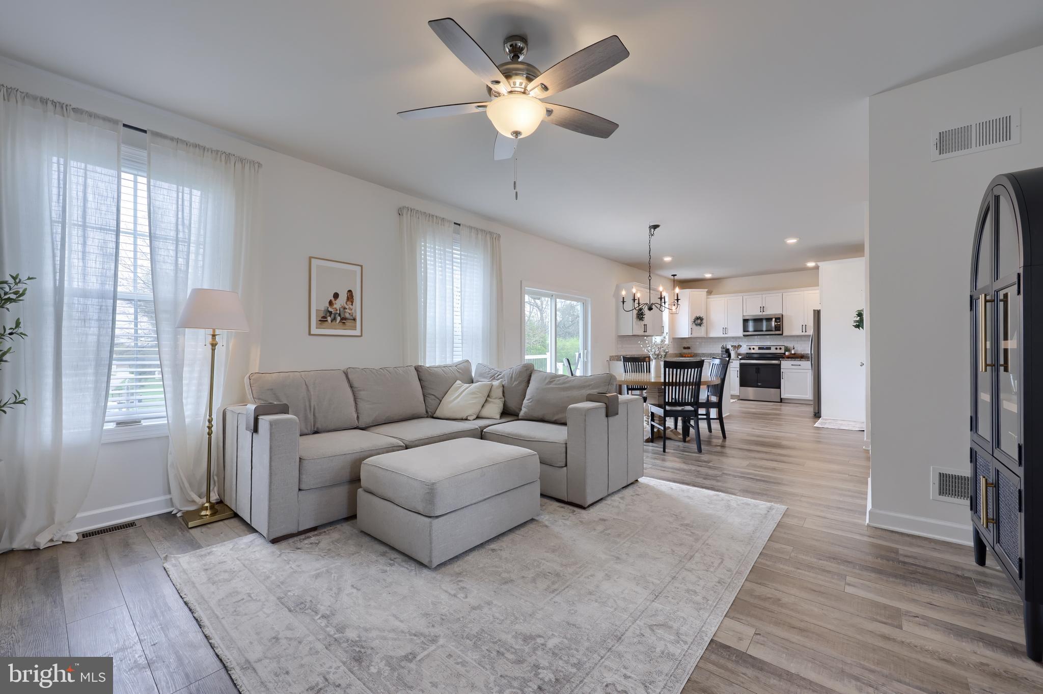 768 Weldon Drive York, PA 17404 - Photo 2 of 36 a living room with furniture and a large window