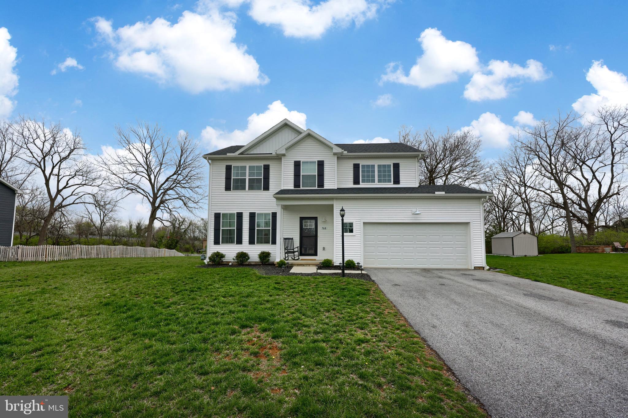 768 Weldon Drive York, PA 17404 - Photo 34 of 36 a front view of a house with garden