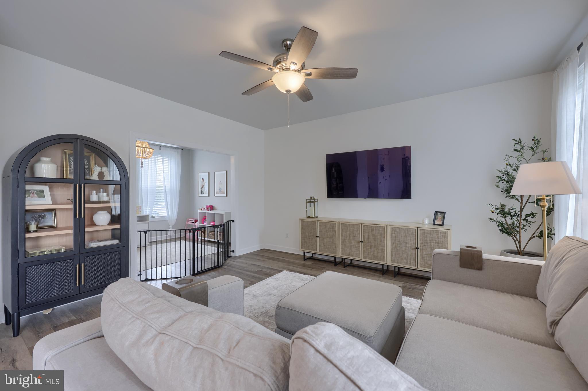 768 Weldon Drive York, PA 17404 - Photo 4 of 36 a living room with furniture and a flat screen tv