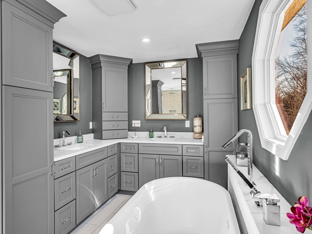 13 Blueberry Drive Acushnet, MA 02743 - Photo 18 of 36 a en suite bathroom with a sink and a mirror