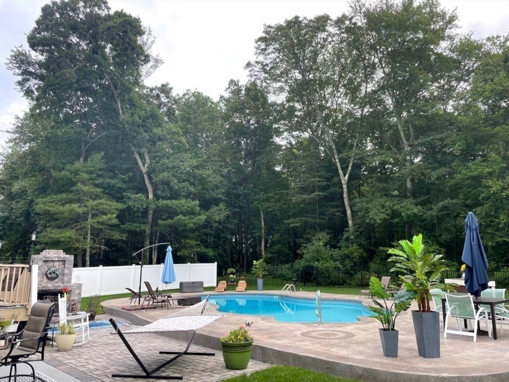 13 Blueberry Drive Acushnet, MA 02743 - Photo 32 of 36 a view of a backyard with sitting area