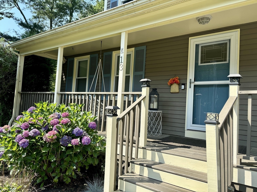 13 Blueberry Drive Acushnet, MA 02743 - Photo 33 of 36 a view of a house with a flower garden