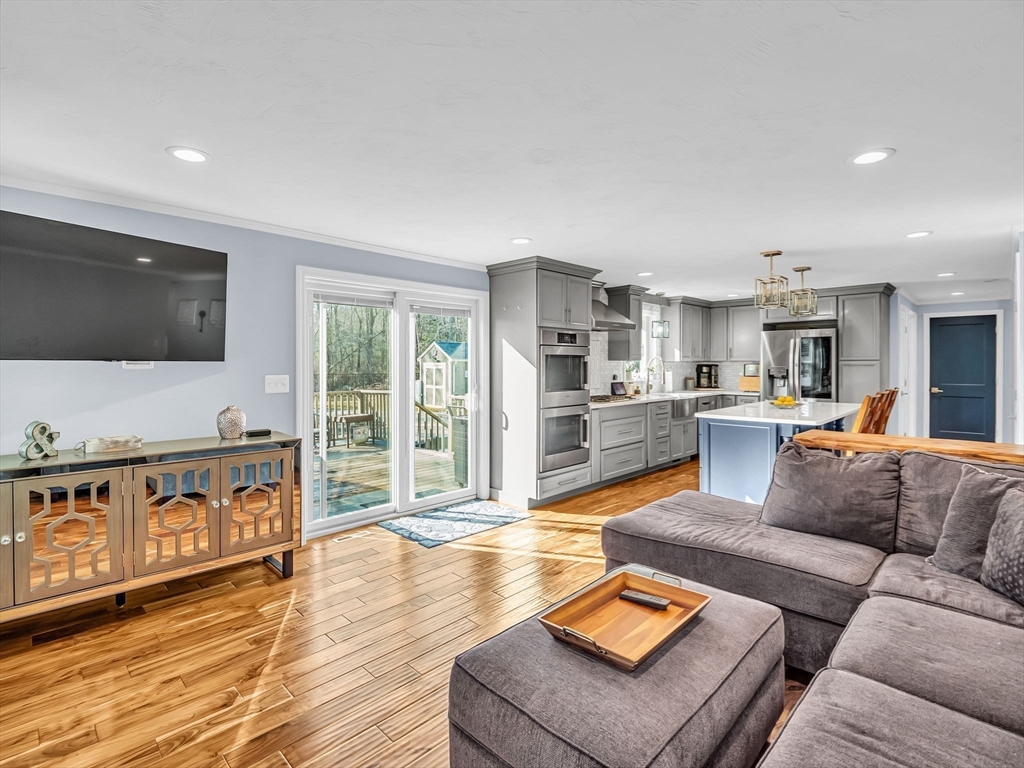 13 Blueberry Drive Acushnet, MA 02743 - Photo 6 of 36 a living room with furniture and a flat screen tv