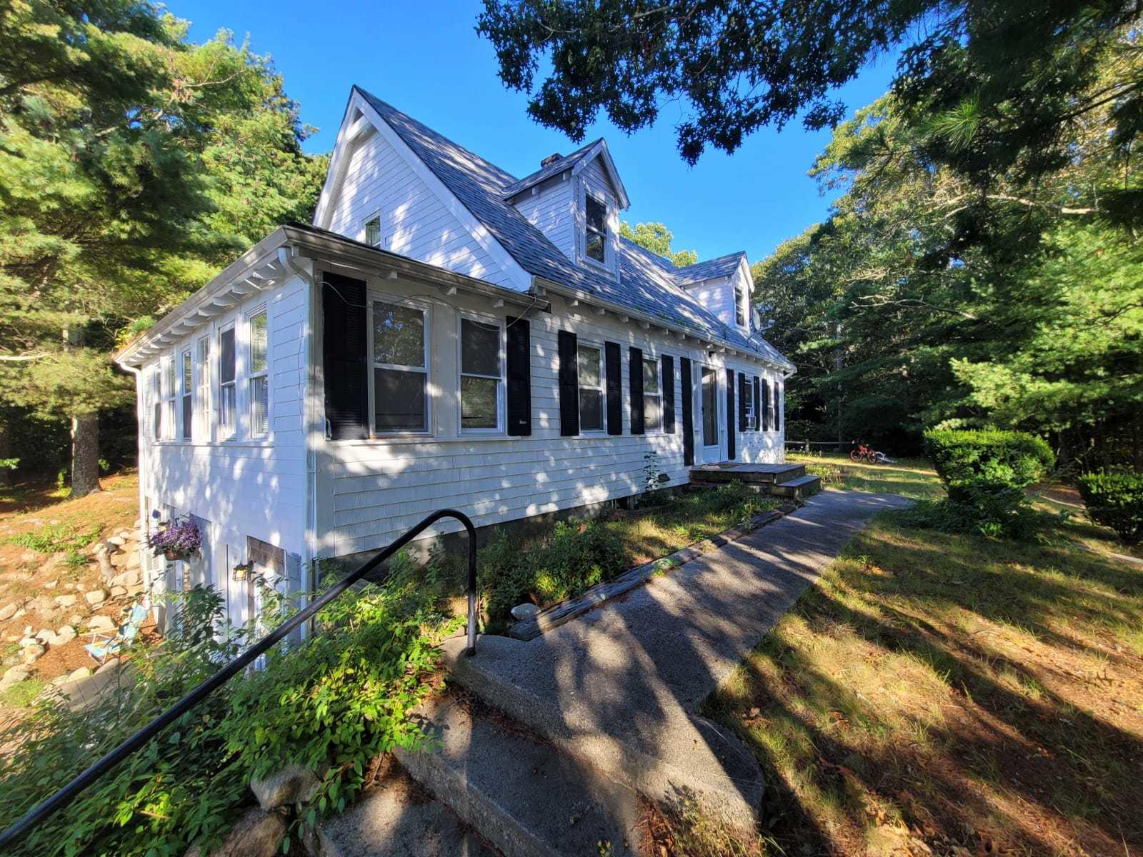 15 Trowbridge Road Bourne, MA 02532 - Photo 4 of 20 a view of a house with a yard