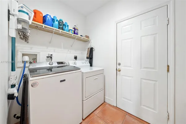 a kitchen with appliances and cabinets