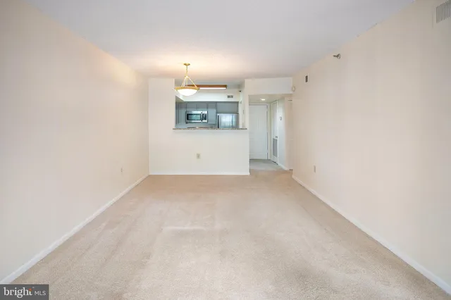 a view of a kitchen with a sink