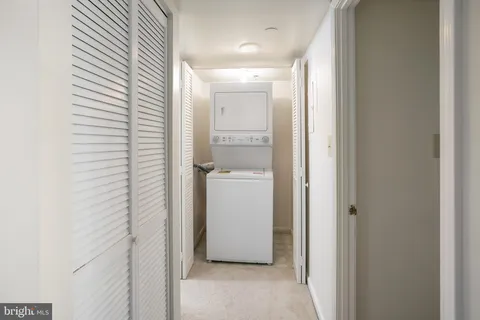 a bathroom with a shower and a sink