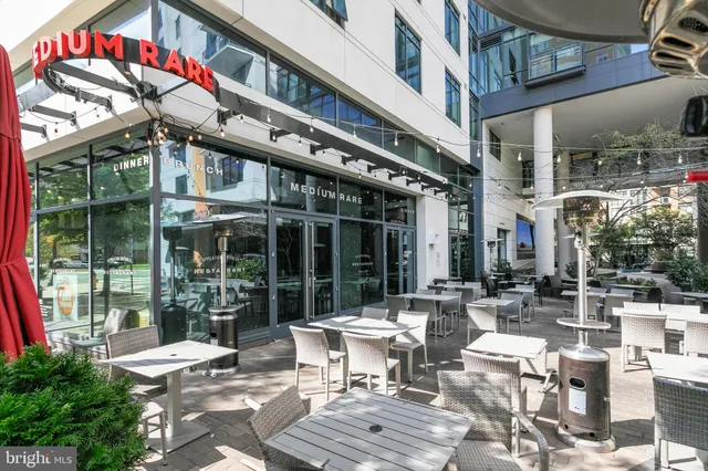 a view of a building with sitting area