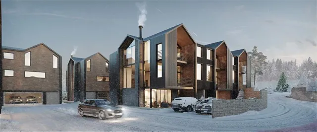 a view of an entryway with table and mirror