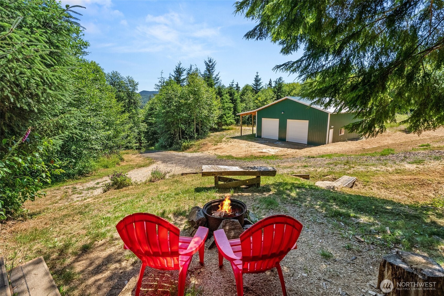 341 Parpala Road Naselle, WA 98638 - Photo 18 of 22 a view of a wooden house with a yard