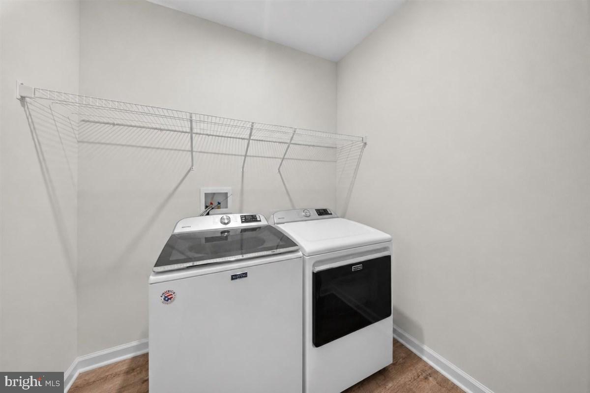 1426 Whispering Woods Road Middletown, DE 19709 - Photo 27 of 37 a utility room with dryer and washer