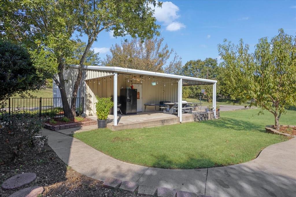 169 Ridgeview Drive Sherman, TX 75090 - Photo 26 of 36 Shop with covered side area