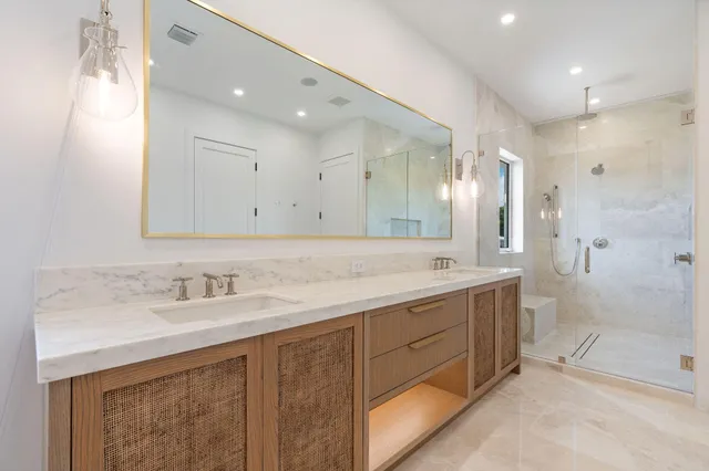 a white bath tub sitting in a bathroom