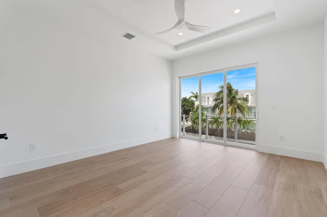 a bathroom with a toilet a sink and shower