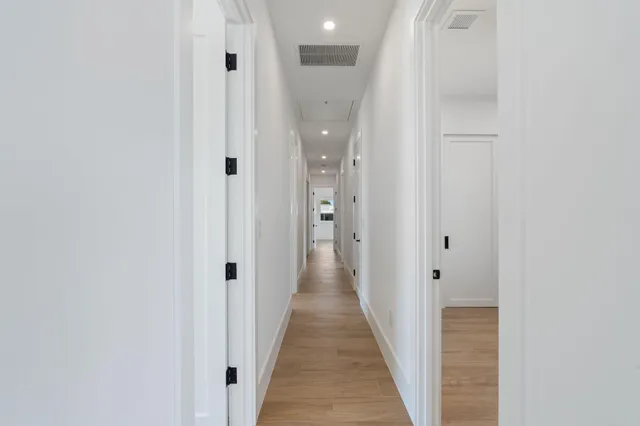 a aerial view of a house with swimming pool and patio