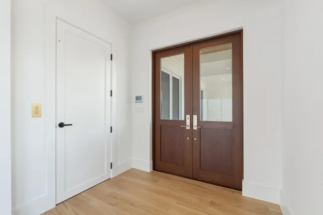 a view of swimming pool with outdoor seating and yard in back