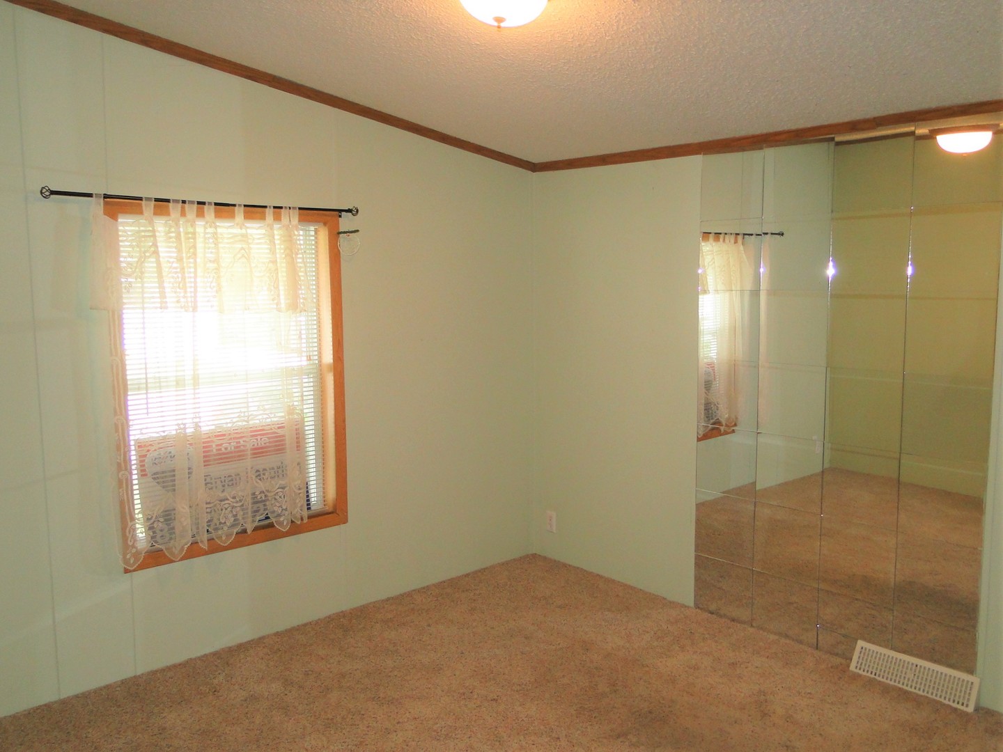 26 Maple Street Minooka, IL 60447 - Photo 11 of 13 a view of an empty room with window and a bathroom