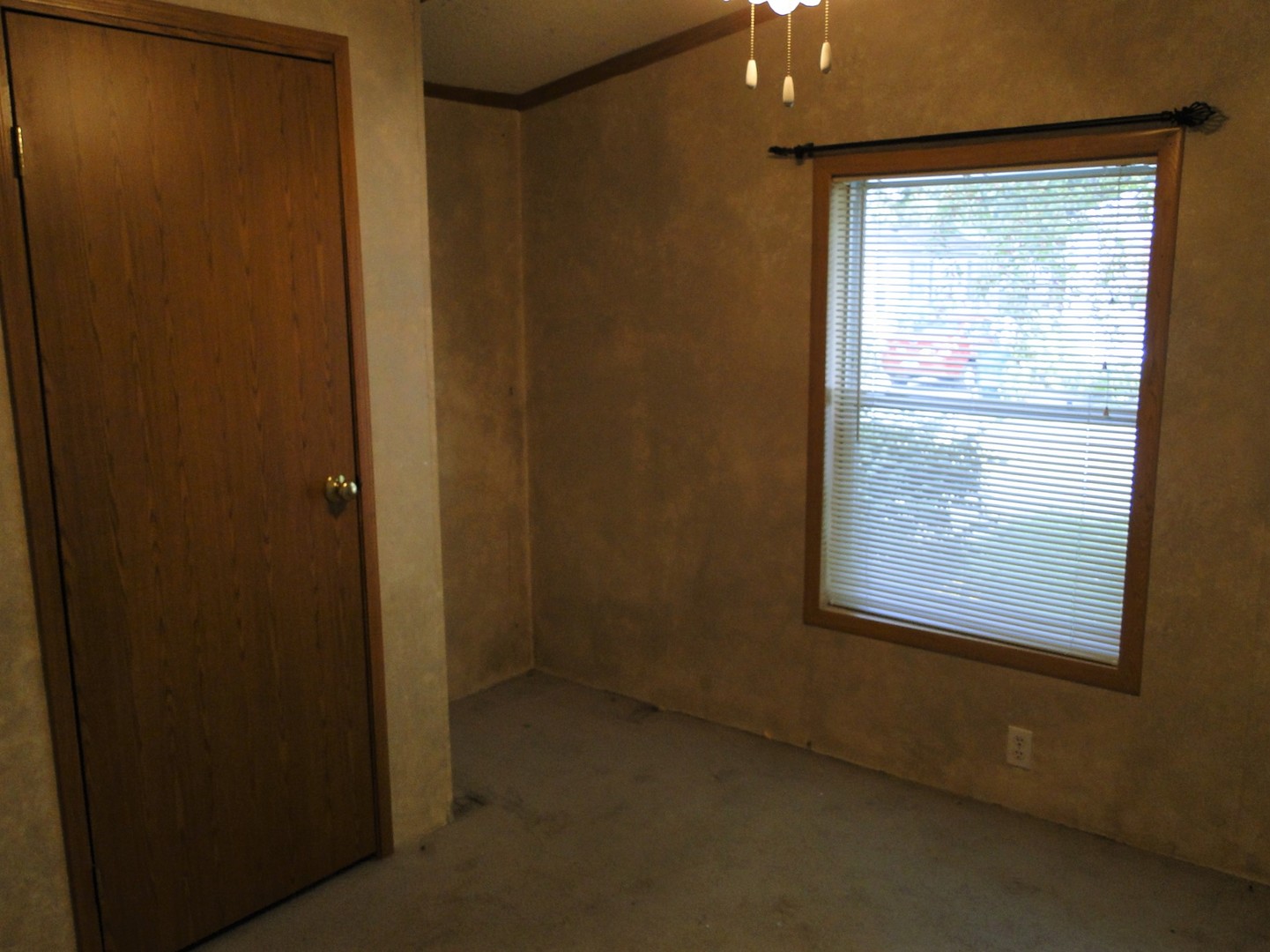 26 Maple Street Minooka, IL 60447 - Photo 12 of 13 a view of an empty room with a window