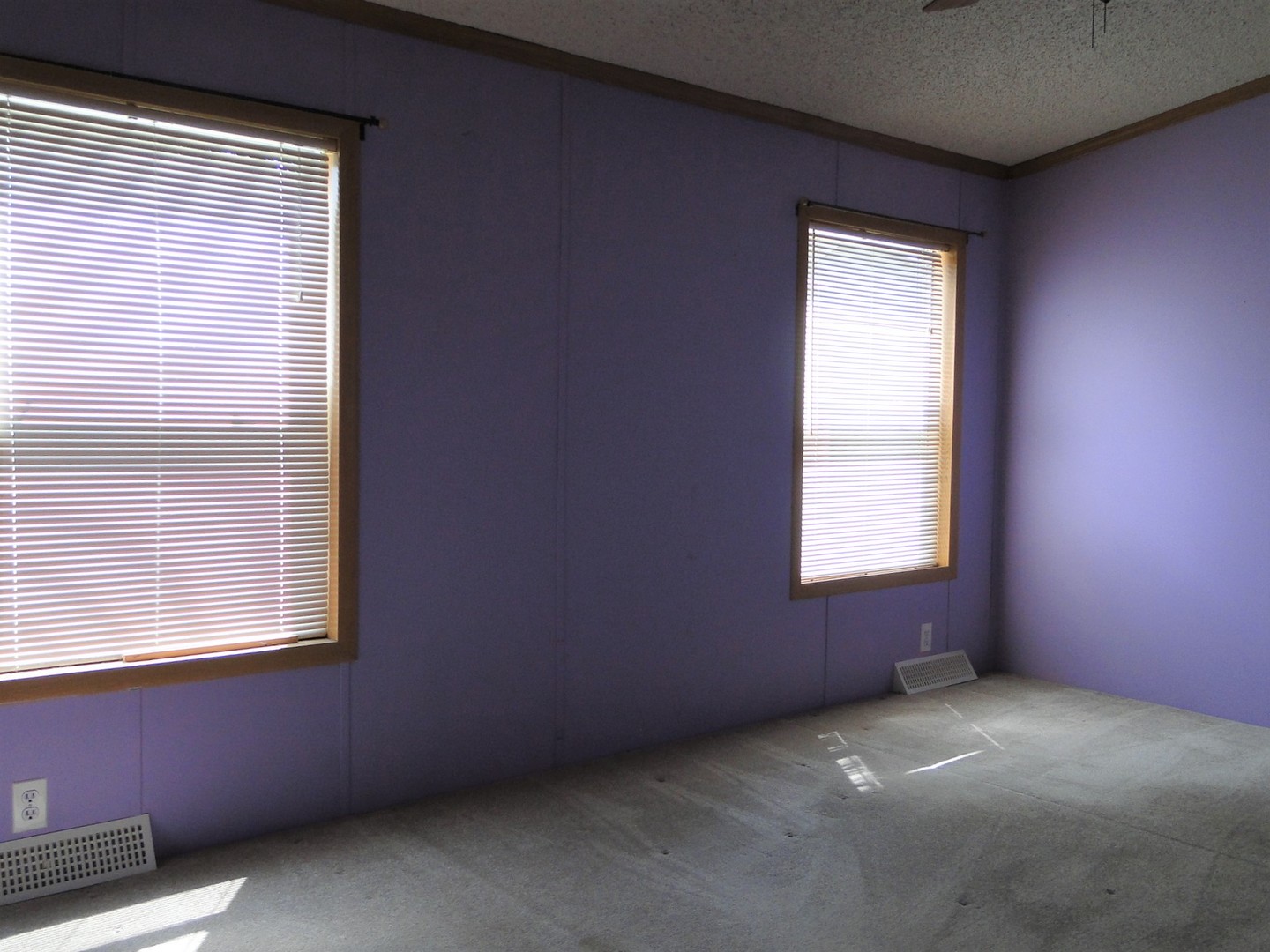 26 Maple Street Minooka, IL 60447 - Photo 8 of 13 a view of an empty room with a window