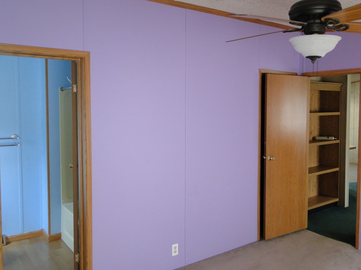 26 Maple Street Minooka, IL 60447 - Photo 9 of 13 a view of a livingroom with shelves