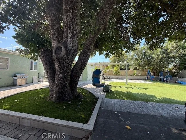 a view of a yard with an outdoor space