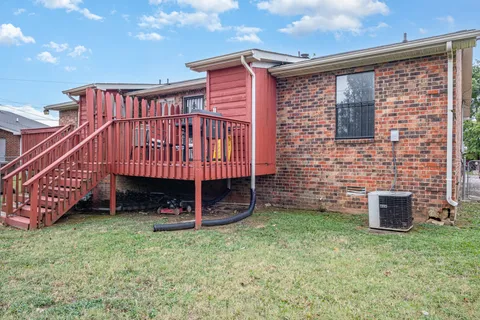 a view of a backyard with a garden